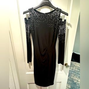 Cach’e Sexy but elegant black dress with rhinestones. size 0 worn 1ce